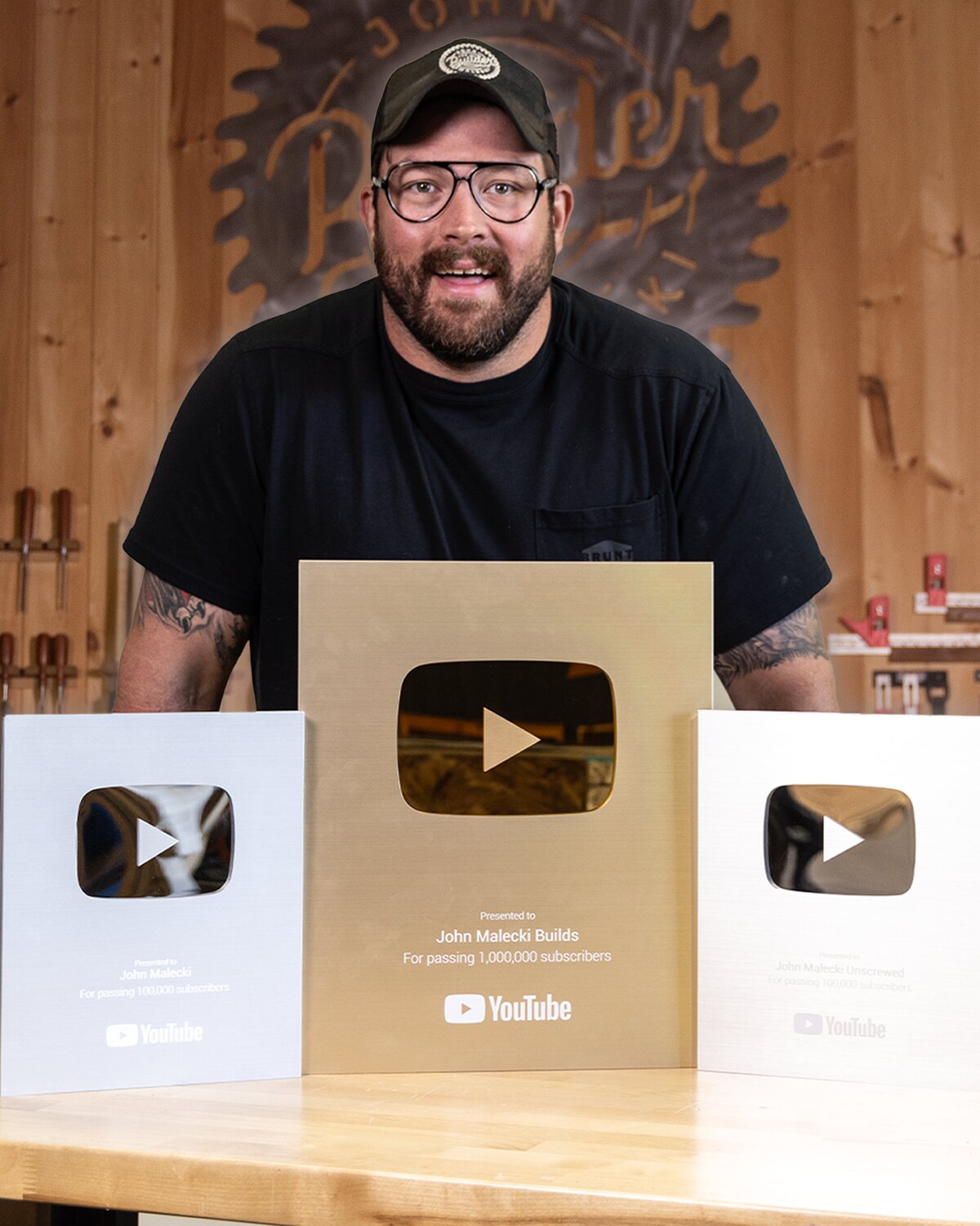 John Malecki with YouTube play buttons